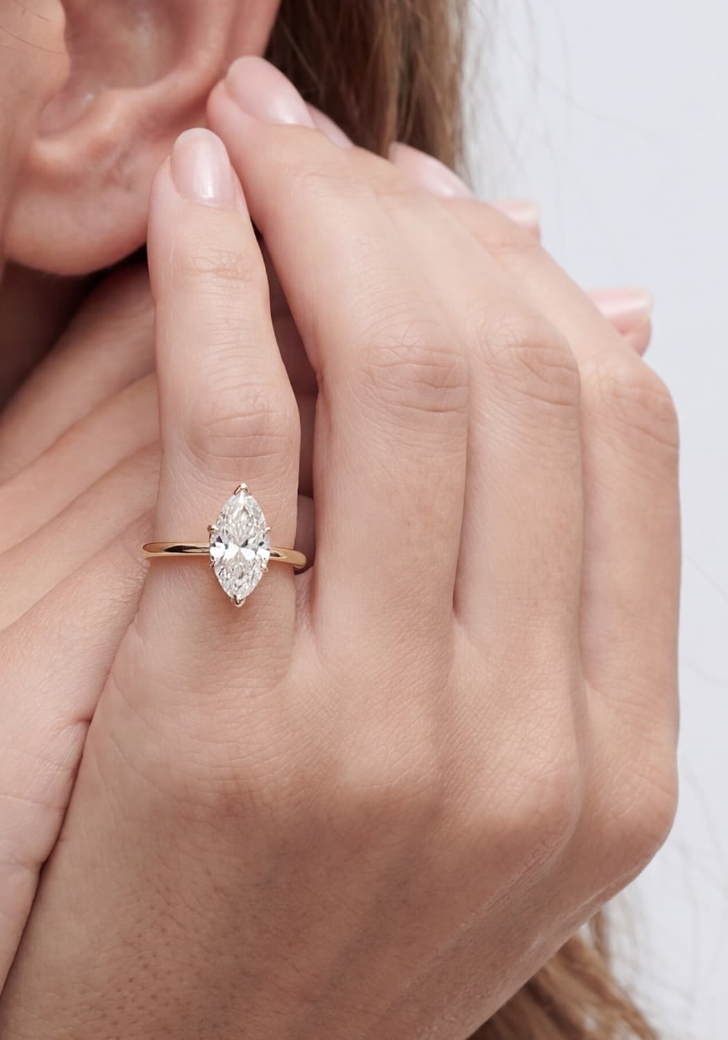 Close-up of a marquise diamond pinky ring worn on hand for the 2026 pinky ring trend